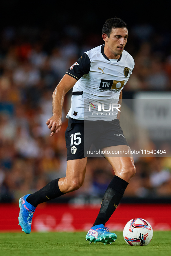 Cesar Tarrega of Valencia CF is in action during the LaLiga EA Sports match between Valencia CF and Villarreal CF at Mestalla stadium in Val...