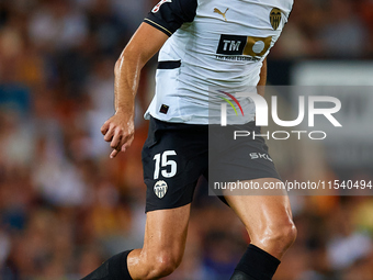 Cesar Tarrega of Valencia CF is in action during the LaLiga EA Sports match between Valencia CF and Villarreal CF at Mestalla stadium in Val...