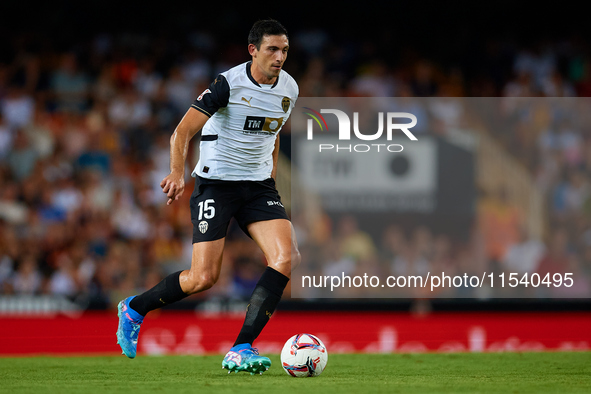 Cesar Tarrega of Valencia CF is in action during the LaLiga EA Sports match between Valencia CF and Villarreal CF at Mestalla stadium in Val...