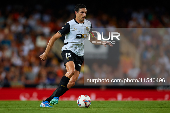 Cesar Tarrega of Valencia CF is in action during the LaLiga EA Sports match between Valencia CF and Villarreal CF at Mestalla stadium in Val...