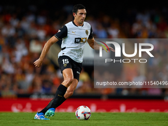 Cesar Tarrega of Valencia CF is in action during the LaLiga EA Sports match between Valencia CF and Villarreal CF at Mestalla stadium in Val...