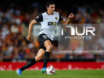 Cesar Tarrega of Valencia CF is in action during the LaLiga EA Sports match between Valencia CF and Villarreal CF at Mestalla stadium in Val...