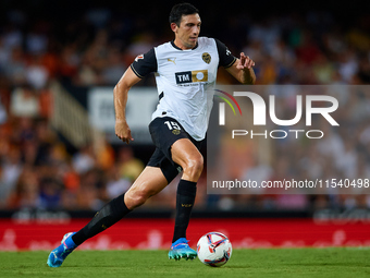 Cesar Tarrega of Valencia CF is in action during the LaLiga EA Sports match between Valencia CF and Villarreal CF at Mestalla stadium in Val...