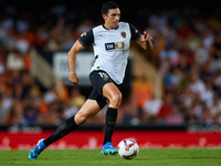 Cesar Tarrega of Valencia CF is in action during the LaLiga EA Sports match between Valencia CF and Villarreal CF at Mestalla stadium in Val...