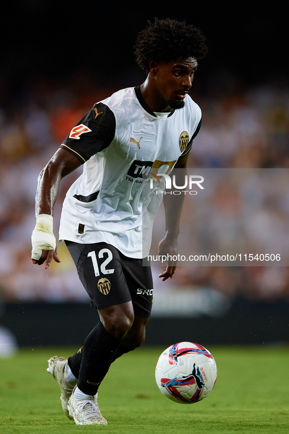 Thierry Rendall of Valencia CF is in action during the LaLiga EA Sports match between Valencia CF and Villarreal CF at Mestalla stadium in V...