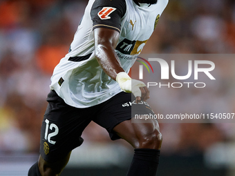 Thierry Rendall of Valencia CF is in action during the LaLiga EA Sports match between Valencia CF and Villarreal CF at Mestalla stadium in V...