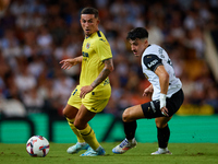 Yeremy Pino of Villarreal CF competes for the ball with Diego Lopez of Valencia CF during the LaLiga EA Sports match between Valencia CF and...