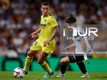 Yeremy Pino of Villarreal CF competes for the ball with Diego Lopez of Valencia CF during the LaLiga EA Sports match between Valencia CF and...