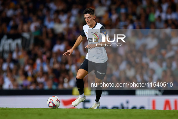 Pepelu of Valencia CF is in action during the LaLiga EA Sports match between Valencia CF and Villarreal CF at Mestalla stadium in Valencia,...