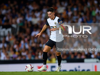 Pepelu of Valencia CF is in action during the LaLiga EA Sports match between Valencia CF and Villarreal CF at Mestalla stadium in Valencia,...