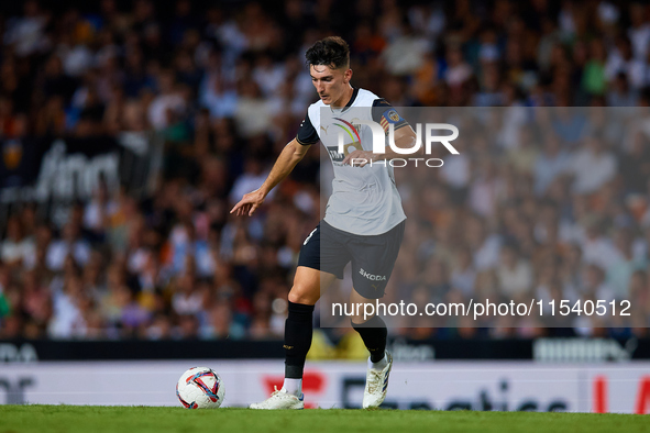 Pepelu of Valencia CF is in action during the LaLiga EA Sports match between Valencia CF and Villarreal CF at Mestalla stadium in Valencia,...