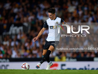 Pepelu of Valencia CF is in action during the LaLiga EA Sports match between Valencia CF and Villarreal CF at Mestalla stadium in Valencia,...