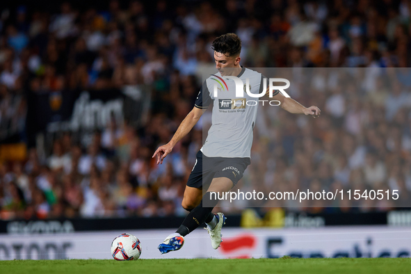 Pepelu of Valencia CF is in action during the LaLiga EA Sports match between Valencia CF and Villarreal CF at Mestalla stadium in Valencia,...