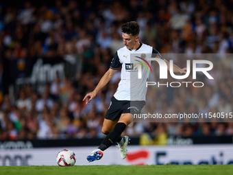 Pepelu of Valencia CF is in action during the LaLiga EA Sports match between Valencia CF and Villarreal CF at Mestalla stadium in Valencia,...