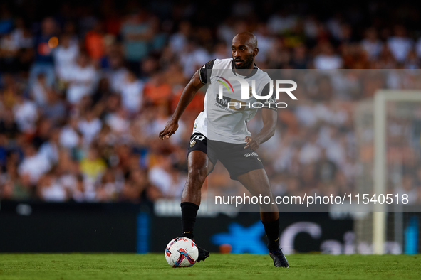 Dimitri Foulquier of Valencia CF is in action during the LaLiga EA Sports match between Valencia CF and Villarreal CF at Mestalla stadium in...