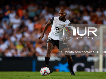 Dimitri Foulquier of Valencia CF is in action during the LaLiga EA Sports match between Valencia CF and Villarreal CF at Mestalla stadium in...