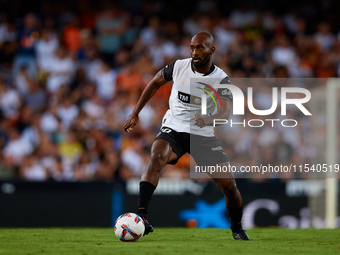 Dimitri Foulquier of Valencia CF is in action during the LaLiga EA Sports match between Valencia CF and Villarreal CF at Mestalla stadium in...