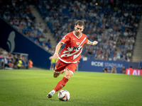 Rayo Vallecano forward takes a powerful shot on goal during the match against Espanyol. (