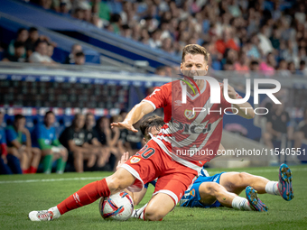 Alvaro Aguado, Ivan Balliu during the LaLiga EA Sports match between RCD Espanyol de Barcelona and Rayo Vallecano, on August 31, 2024.  (