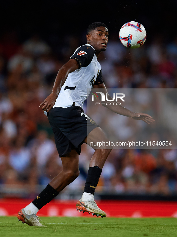 Cristhian Mosquera of Valencia CF is in action during the LaLiga EA Sports match between Valencia CF and Villarreal CF at Mestalla stadium i...