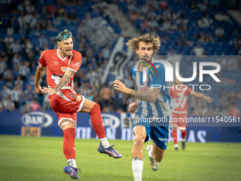 Alex Kral, Andrei Florin during the LaLiga EA Sports match between RCD Espanyol de Barcelona and Rayo Vallecano, on August 31, 2024.  (