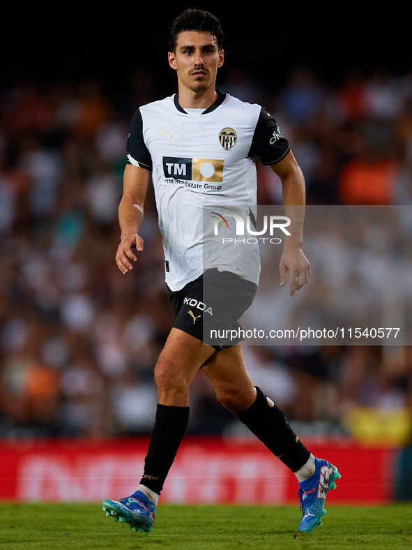 Andre Almeida of Valencia CF is in action during the LaLiga EA Sports match between Valencia CF and Villarreal CF at Mestalla stadium in Val...