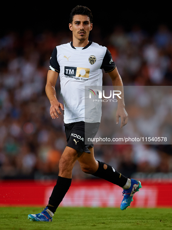 Andre Almeida of Valencia CF is in action during the LaLiga EA Sports match between Valencia CF and Villarreal CF at Mestalla stadium in Val...