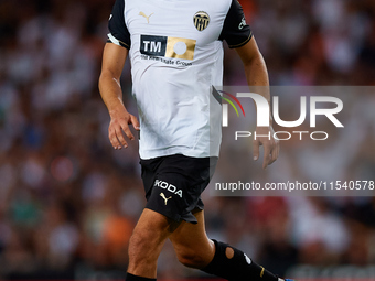 Andre Almeida of Valencia CF is in action during the LaLiga EA Sports match between Valencia CF and Villarreal CF at Mestalla stadium in Val...