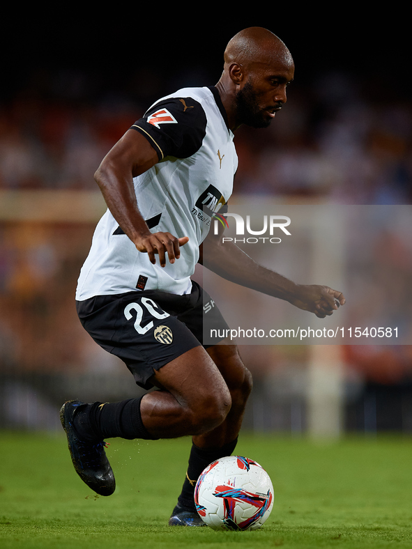 Dimitri Foulquier of Valencia CF is in action during the LaLiga EA Sports match between Valencia CF and Villarreal CF at Mestalla stadium in...