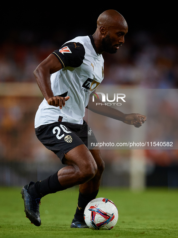 Dimitri Foulquier of Valencia CF is in action during the LaLiga EA Sports match between Valencia CF and Villarreal CF at Mestalla stadium in...