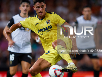 Sergi Cardona of Villarreal CF is in action during the LaLiga EA Sports match between Valencia CF and Villarreal CF at Mestalla stadium in V...