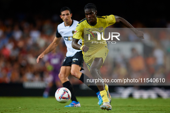 Thierno Barry of Villarreal CF is in action during the LaLiga EA Sports match between Valencia CF and Villarreal CF at Mestalla stadium in V...