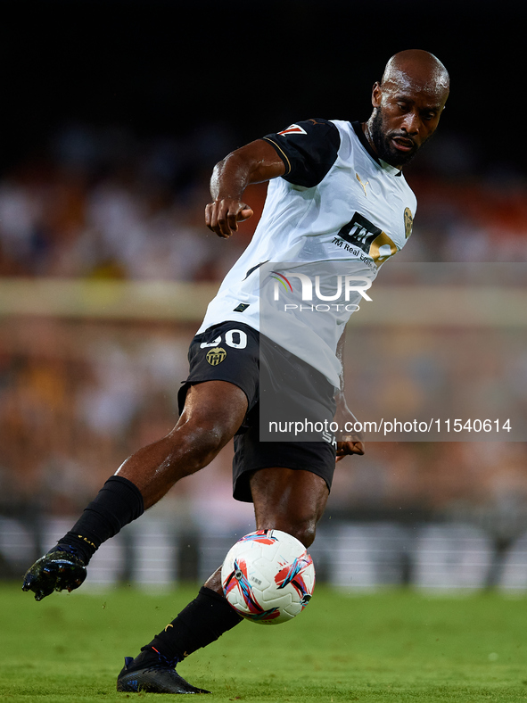 Dimitri Foulquier of Valencia CF is in action during the LaLiga EA Sports match between Valencia CF and Villarreal CF at Mestalla stadium in...