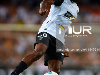 Dimitri Foulquier of Valencia CF is in action during the LaLiga EA Sports match between Valencia CF and Villarreal CF at Mestalla stadium in...