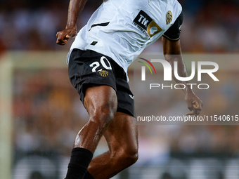 Dimitri Foulquier of Valencia CF is in action during the LaLiga EA Sports match between Valencia CF and Villarreal CF at Mestalla stadium in...