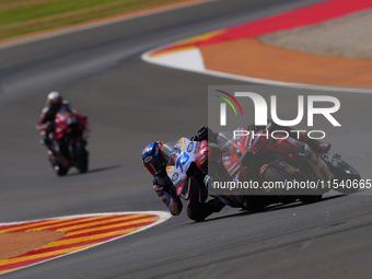 Francesco Pecco Bagnaia (1) of Italy and Ducati Lenovo Team crashing with Alex Marquez (73) of Spain and Gresini Racing Moto GP Ducati durin...