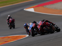 Francesco Pecco Bagnaia (1) of Italy and Ducati Lenovo Team crashing with Alex Marquez (73) of Spain and Gresini Racing Moto GP Ducati durin...