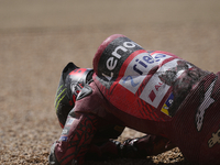 Francesco Pecco Bagnaia (1) of Italy and Ducati Lenovo Team after crashing with Alex Marquez (73) of Spain and Gresini Racing Moto GP Ducati...