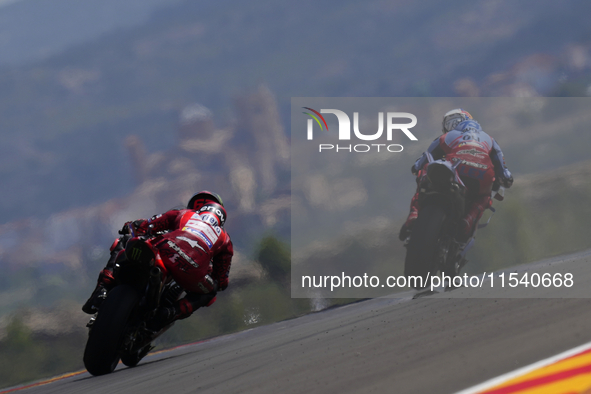 Francesco Pecco Bagnaia (1) of Italy and Ducati Lenovo Team and Alex Marquez (73) of Spain and Gresini Racing Moto GP Ducati during the race...