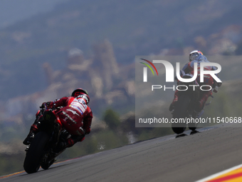 Francesco Pecco Bagnaia (1) of Italy and Ducati Lenovo Team and Alex Marquez (73) of Spain and Gresini Racing Moto GP Ducati during the race...