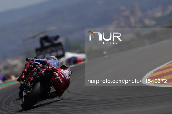 Alex Marquez (73) of Spain and Gresini Racing Moto GP Ducati and Francesco Pecco Bagnaia (1) of Italy and Ducati Lenovo Team during the race...