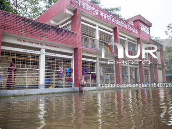 A few families take shelter in a school for 10 days after being affected by flood water in a village of Sonapur Union of Sonaimuri Upazila o...