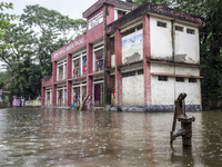 A few families take shelter in a school for 10 days after being affected by flood water in a village of Sonapur Union of Sonaimuri Upazila o...