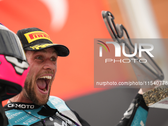 Jake Dixon (96) of Great Brof Italy and in and Cfmoto Inde Aspar Team Kalex celebrates victory after the race day of the Gran Premio GoPro d...