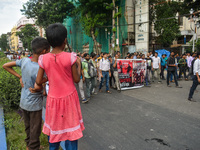 Children observe a protest rally by doctors regarding the rape and murder of a second-year PGT doctor in Kolkata, India, on September 2, 202...