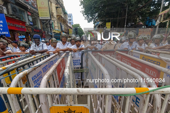 Police barricade during a protest rally of doctors in Kolkata, India, on September 2, 2024. 