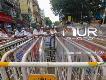 Police barricade during a protest rally of doctors in Kolkata, India, on September 2, 2024. (