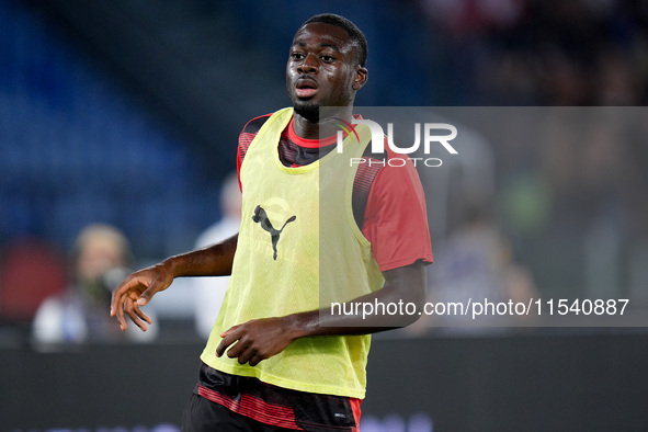 Youssouf Fofana of AC Milan looks on during the Serie A Enilive match between SS Lazio and AC Milan at Stadio Olimpico on Aug 31, 2024 in Ro...