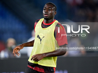 Youssouf Fofana of AC Milan looks on during the Serie A Enilive match between SS Lazio and AC Milan at Stadio Olimpico on Aug 31, 2024 in Ro...