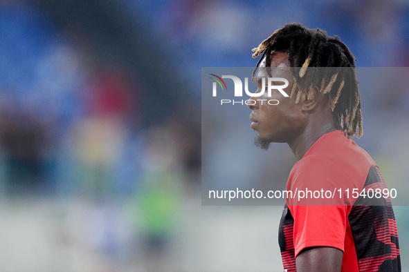 Samuel Chukwueze of AC Milan looks on during the Serie A Enilive match between SS Lazio and AC Milan at Stadio Olimpico on Aug 31, 2024 in R...